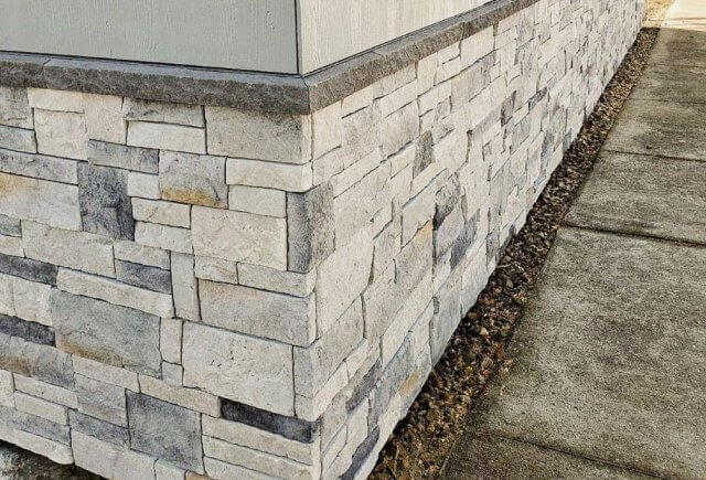 gray and white faux stone veneer panels